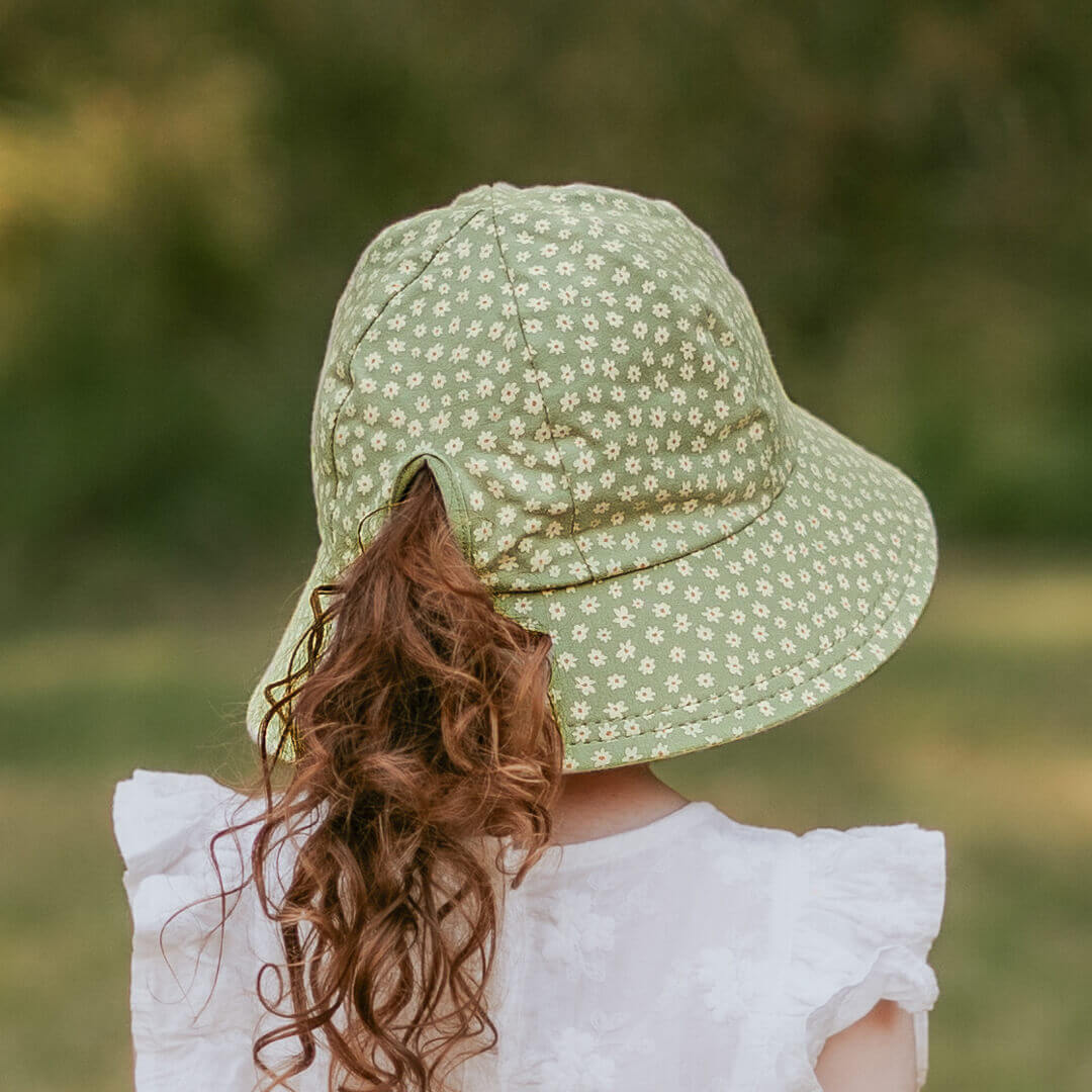 Back of green ponytail sun hat by Bedhead Hats on girl
