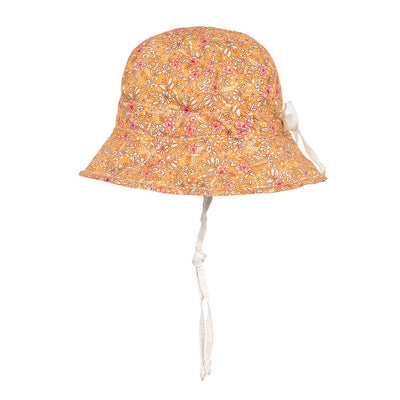 Another side view Bedhead Hats panelled sun hat with chin ties
