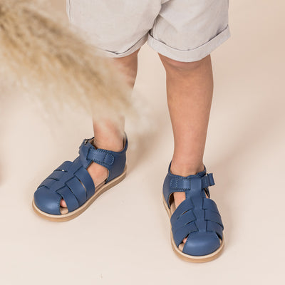 Toddler boy wearing Pretty Brave Rocco denim sandals